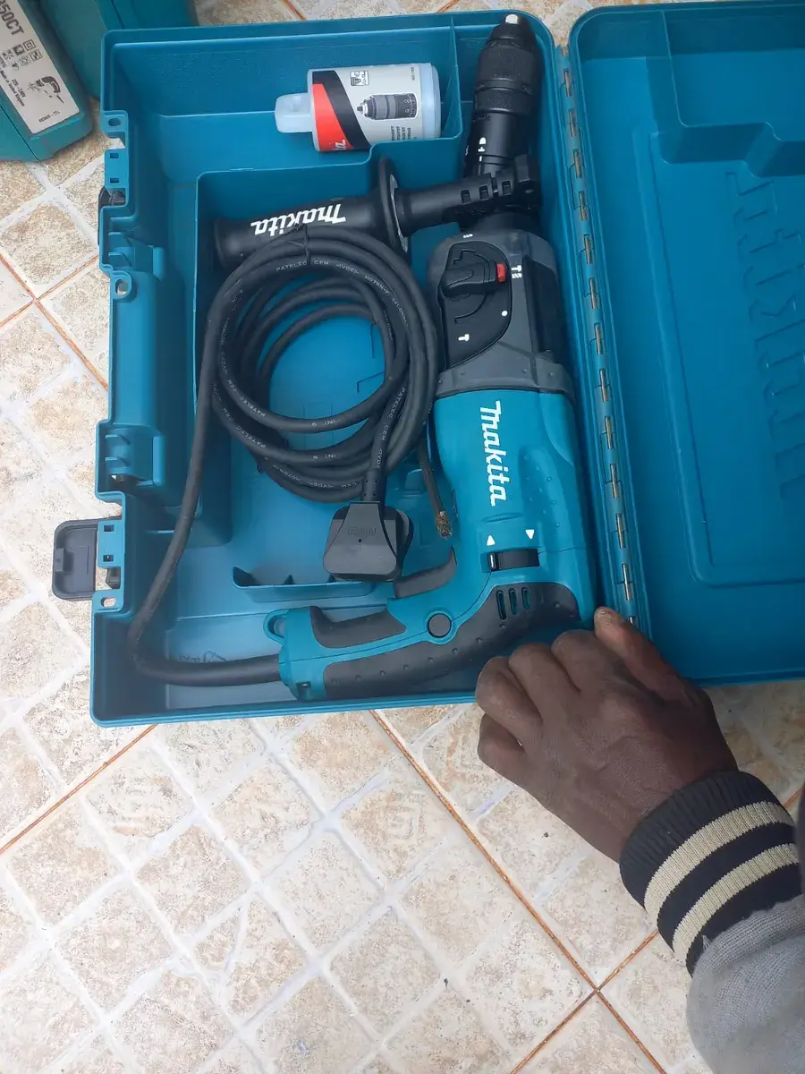 Rotary hummer drill